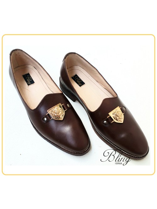 Brown lion loafers