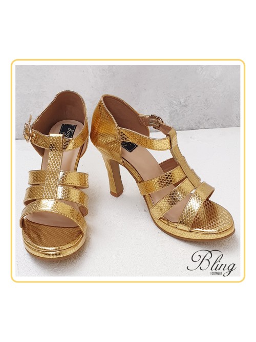 Golden strappy heels