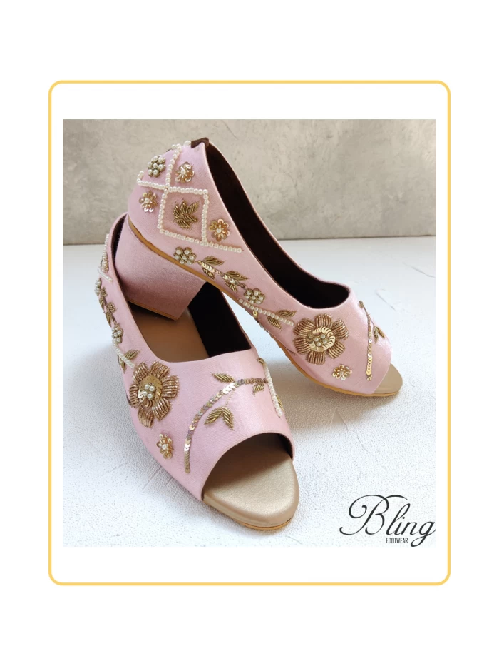 Light pink tikki work peeptoes